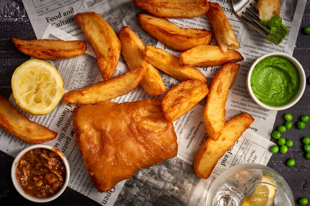 Traditional fish and chips, minted pea purée, “chip shop sauce”